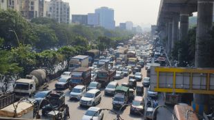 path blocked by containers traffic jam on main road thane