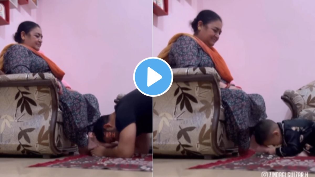 a child touching feet of grand mother