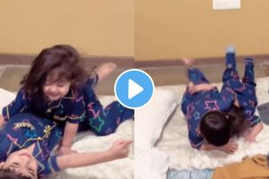 a child playing with his sister and enjoying fun video
