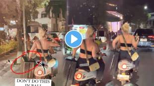 Girl drinks beer and holds luggage in a bike video went viral in bali watch