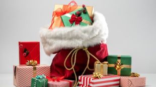 man receives chocolates as a secret Santa gift