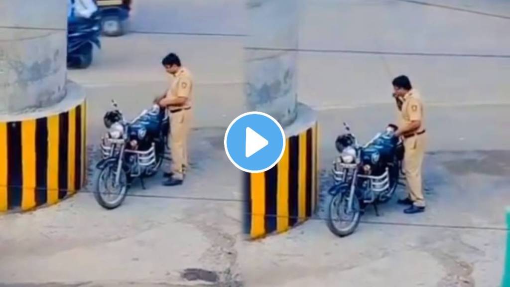 nashik a dutiful policeman had lunch on a bike by keeping a box netizens salute to the officer video viral