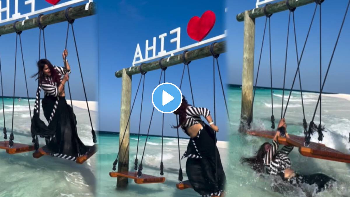 Girl fell in water while dancing on swing in sea video viral