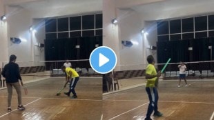 man playing badminton with jharu After Watch This unique playing style Of Game netizens react on viral video