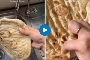 Woman washes naan before consuming it