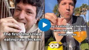 man eating raw chicken for his own experiment