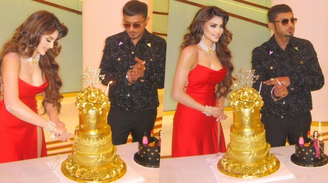 urvashi rautela cuts 24 carat real gold plated cake on her birthday