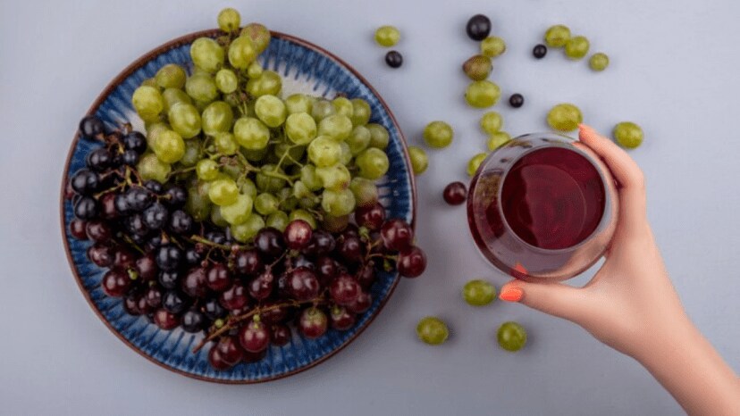 How does consuming grapes improve overall health as well as heart health