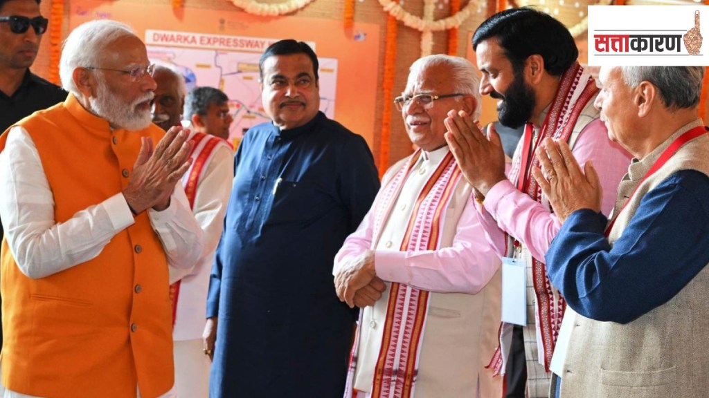 Nayab Singh Saini (second from right) greets Prime Minister Narendra Modi along with Manohar Lal Khattar