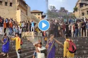 Boys pouring water on woman at manikarnika ghat varanasi video