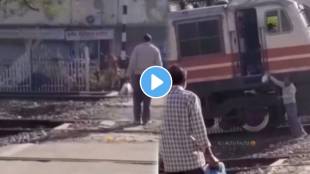 Person stopped at the railway gates to deliver the parcel to the motorman video