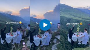 couple dining in mid air viral romantic dinner date video