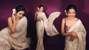 Mitali Mayekar designer golden saree and purple sleevless blouse look photos viral