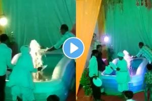 people washing plates in fountain in wedding