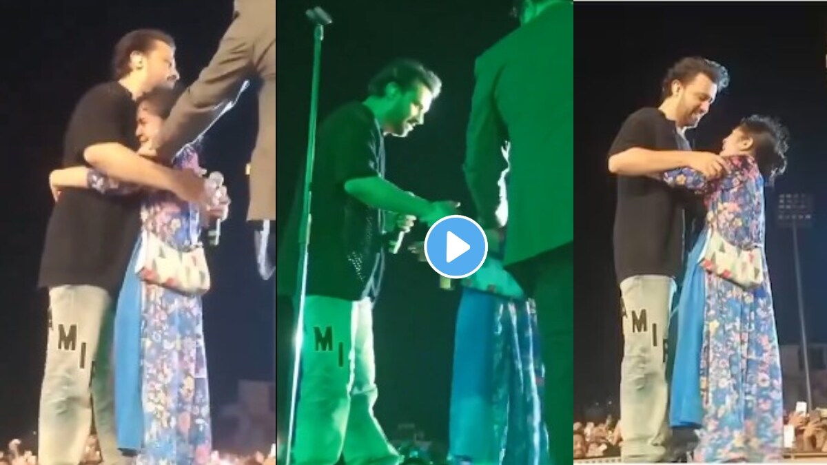 Emotional fan hugs Atif Aslam during live concert kisses his hands singers response viral video