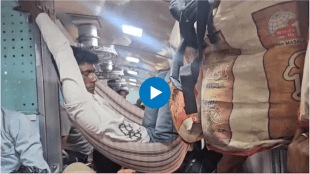 Passenger sleeps in makeshift hammock in overcrowded Brahmaputra Mail Railway Pics video