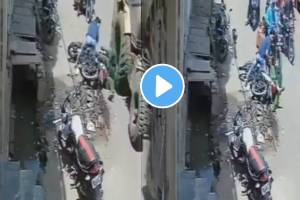 Meerut jcb accident couple bike hit by jcb machine women save by narrow escape video