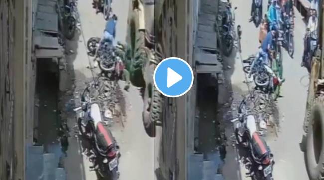 Meerut jcb accident couple bike hit by jcb machine women save by narrow escape video