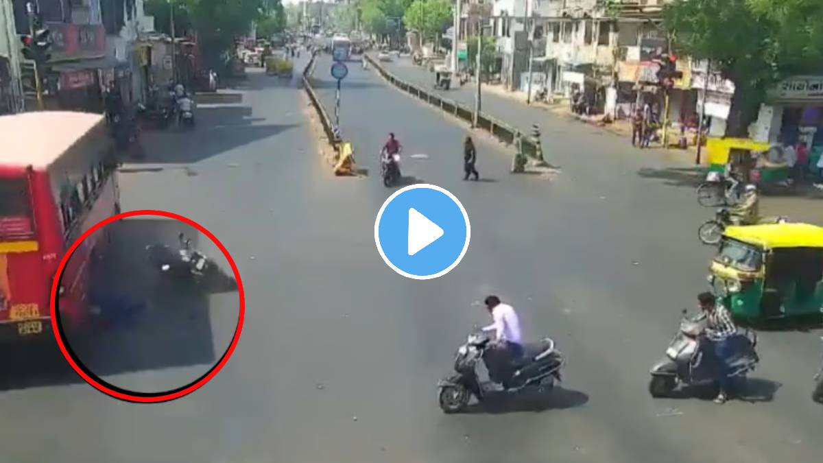 Shocking Accident in Ahmedabad Terrifying CCTV Footage Shows Biker Run Over By Speeding Bus