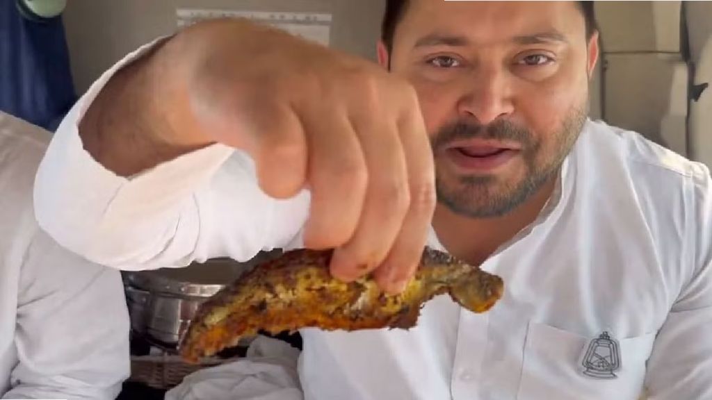 Tejashwi Prasad Yadav eating fish