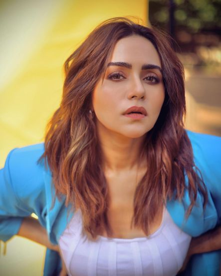 Amruta khanvilkar denim skirt and jacket look photos viral on social media