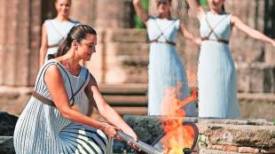 paris 2024 olympics olympic torch lit in greece