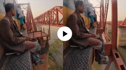 people are travelling in a dangerous way by train