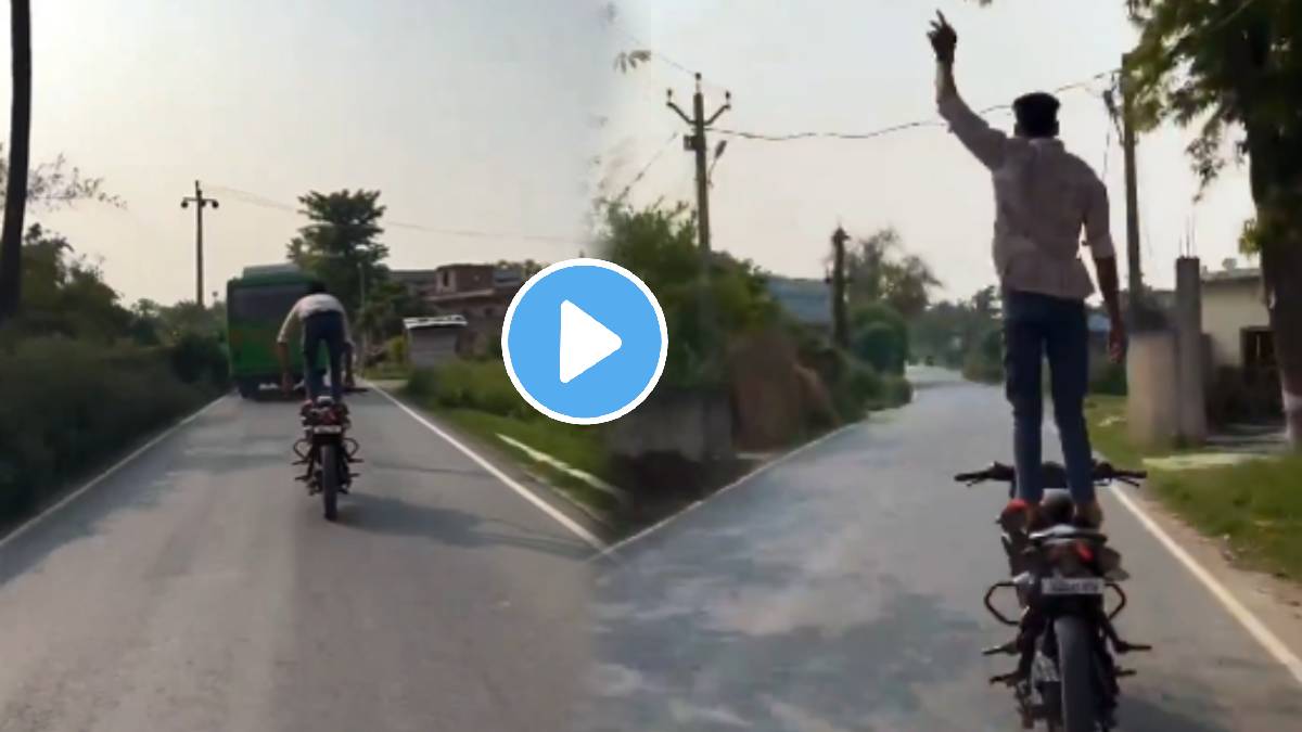 Stunt on bike a man stood on a moving bike and started overtaking