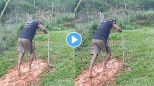 man walks In slanted land which is full of mud doing a workout on a unique treadmill under the open sky watch viral video