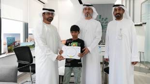 Indian boy for returning tourist lost watch Dubai Tourist Police Department recognised Ayan for his honesty and good judgement