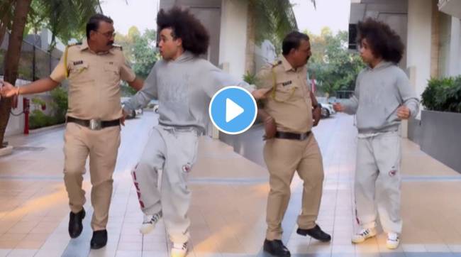 Video Mumbai’s dancing cop Amol Kamble dancing On Calm Down song With TikToker Noel Robinson German TikToker