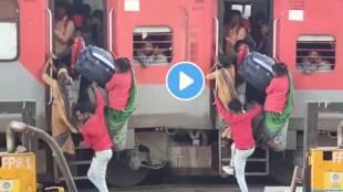 overcrowded train as it leaves the railway station Man and Woman getting struggle onto an Moving train watch ones