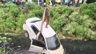car Sinks in canal