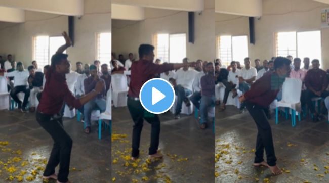 A young man presents amazing lavani dance in front of teachers
