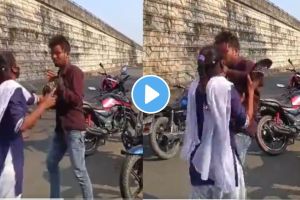 a girl beating a guy by chappal or footwear as he Was Passing Bad Comments on School girls