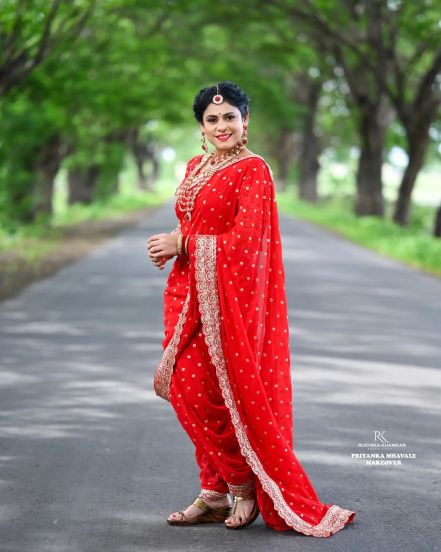 Ashvini Mahangade Red Nauvari Saree