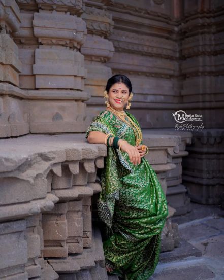 Ashvini Mahangade Red Nauvari Saree