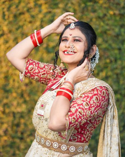 Ashvini Mahangade Red Nauvari Saree