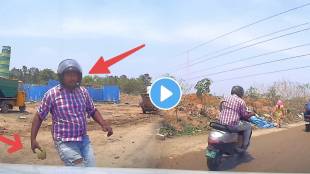 dash camera footage electric scooter stopped User car on the road and hit car window rear glass with a tender coconut shell