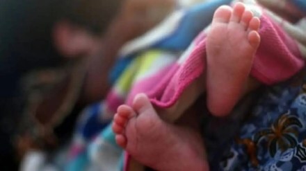 young woman threw baby in garbage heap