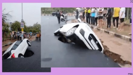 Car trapped as crater develops on road