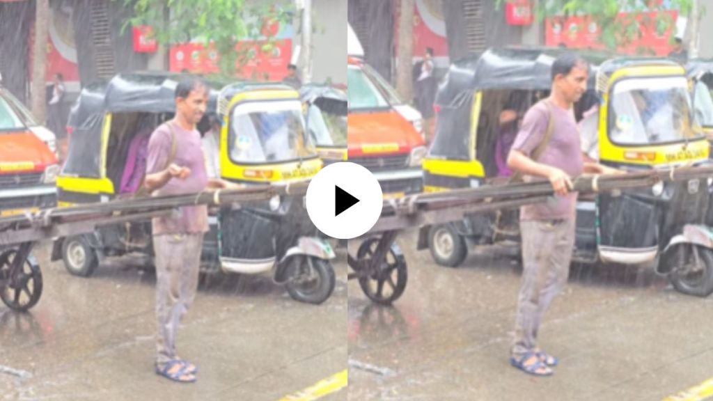 a man carries Hand Cart Pushers in heavy rain