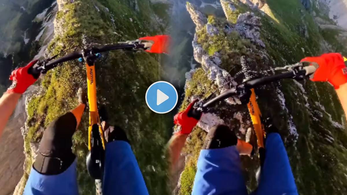 Viral video shows daring mountain cycle ride