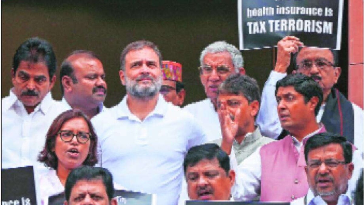 opposition stages protest seeking withdrawal of 18 percent gst on life and health insurance