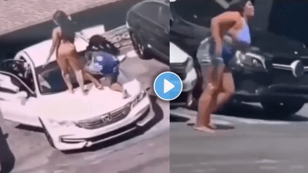 Viral Video of a woman climbs on a car and the glass breaks, causing an accident