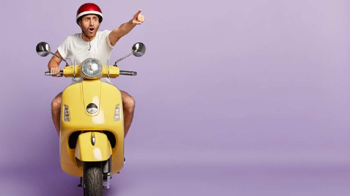 Driving a scooty in the wrong way