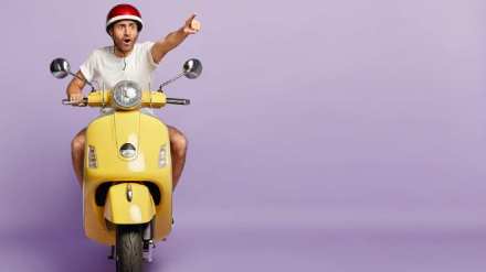 Driving a scooty in the wrong way