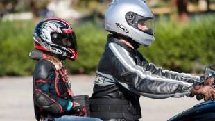Mandatory helmets on two wheeler along with rider on back seat is a decision that disturbs general public sentiment