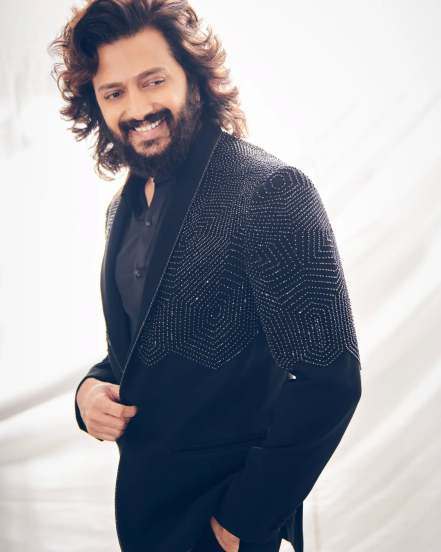 Bollywood star Ritesh Deshmukh shares his bold look in Black Suit on social media