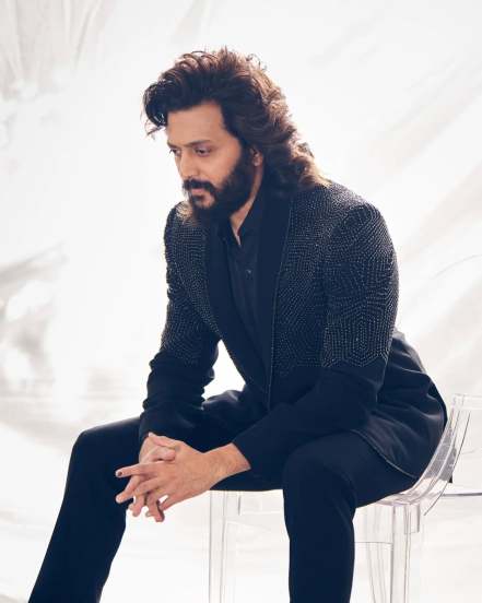 Bollywood star Ritesh Deshmukh shares his bold look in Black Suit on social media